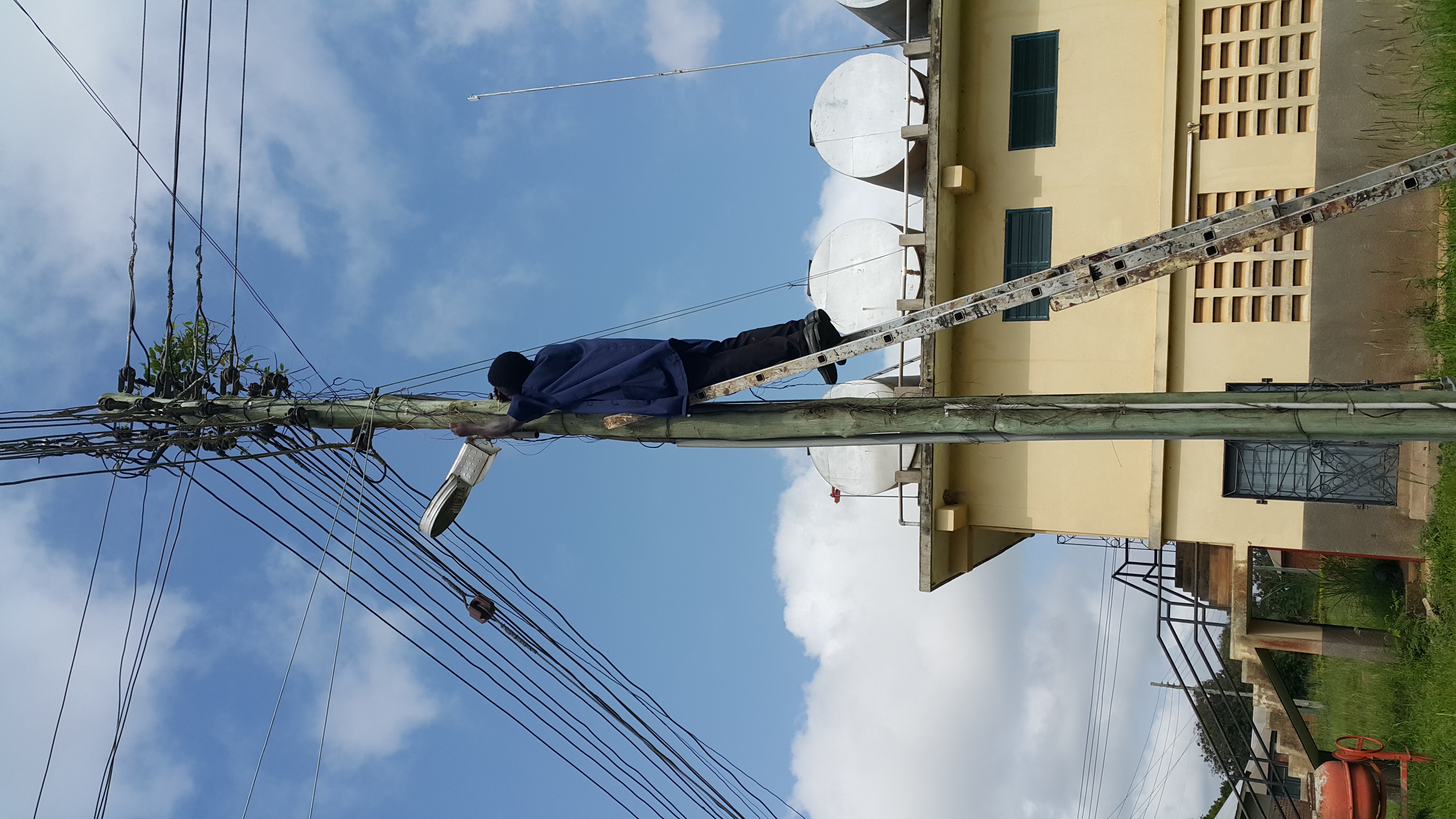 Students working on domestic and industrial electrical installation panels and solar systems